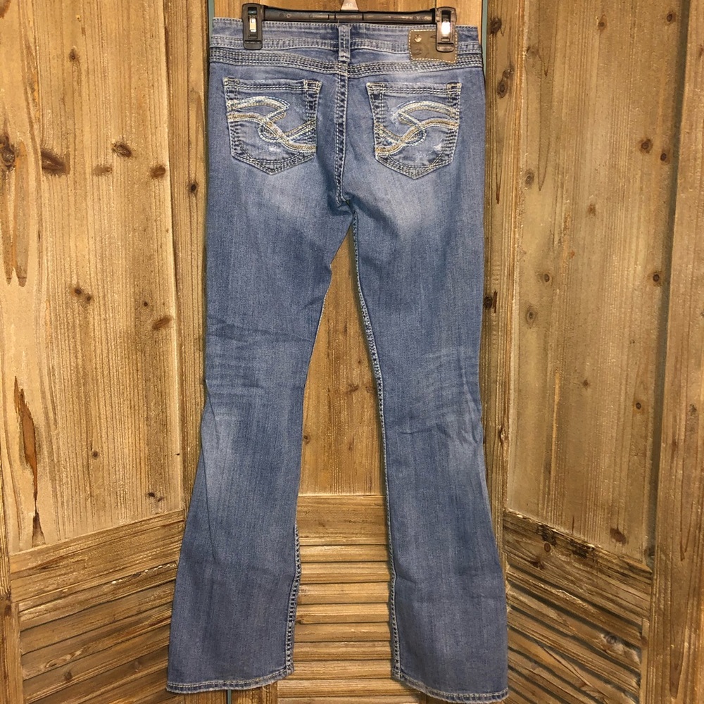 Silver Twisted Jeans. Distressed.